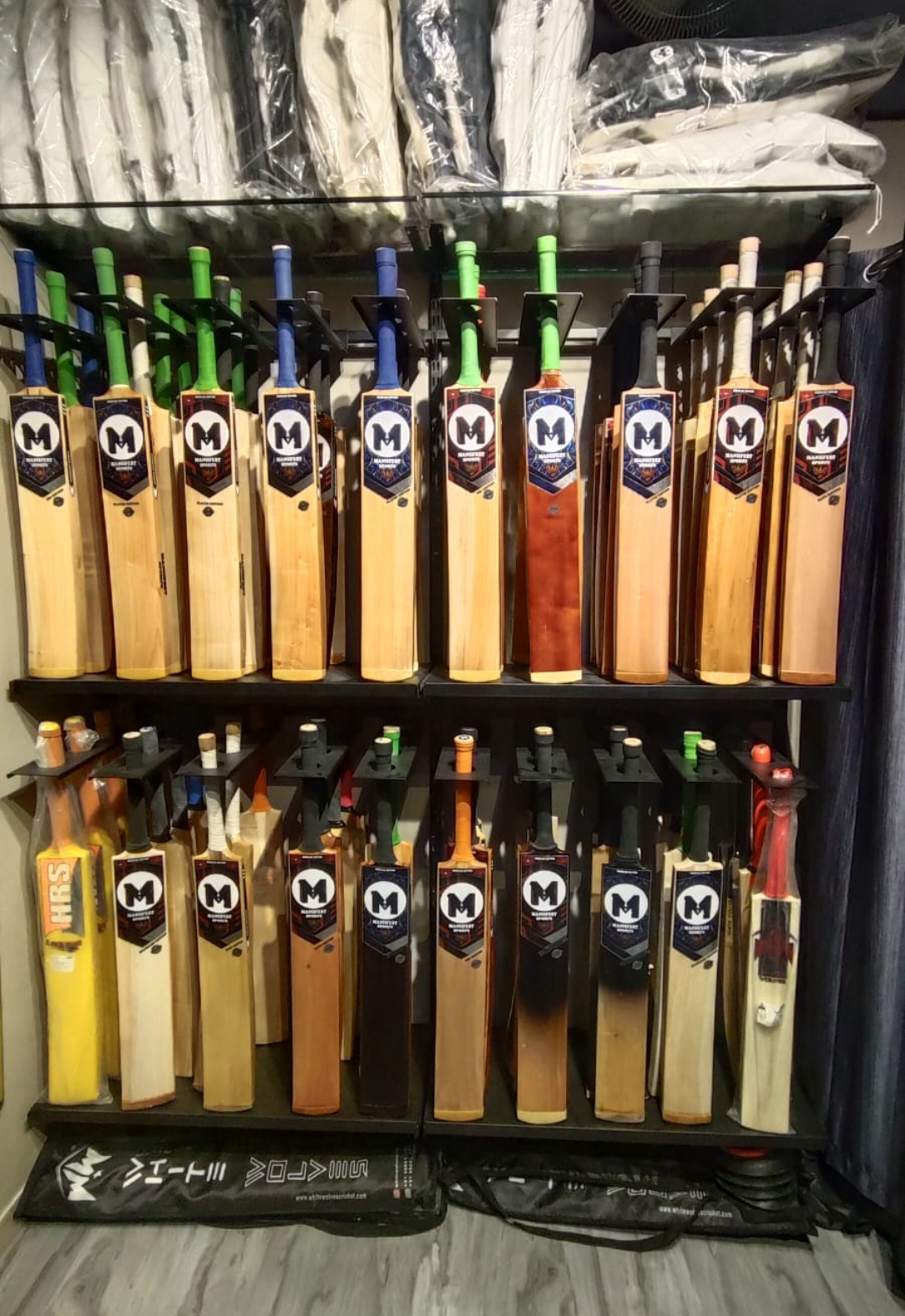 Premium cricket bat display at Maniifest Sports